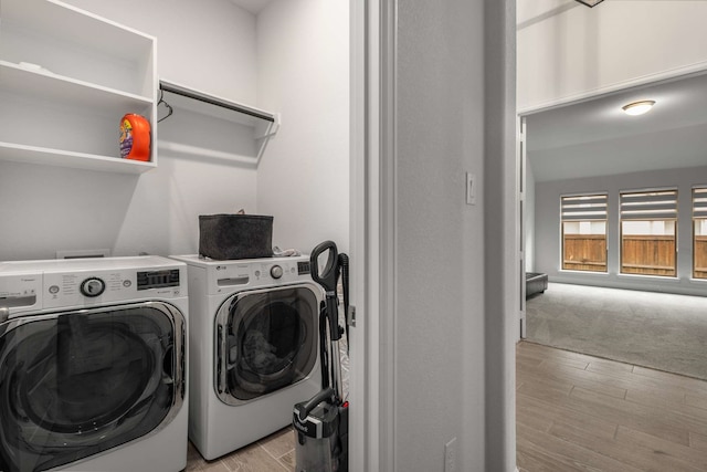 5716 Turner May Dr, Fort Worth, TX 76126 - laundry room featuring washing machine and clothes dryer and light wood-style floors
