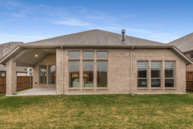 5716 Turner May Dr, Fort Worth, TX 76126 - rear view of house with a patio area, brick siding, and roof with shingles