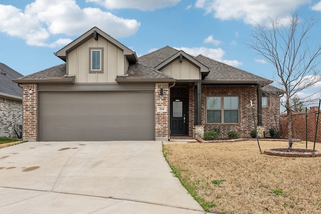 view of front facade with a front yard and a garage