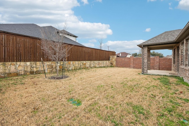 view of yard with a patio area