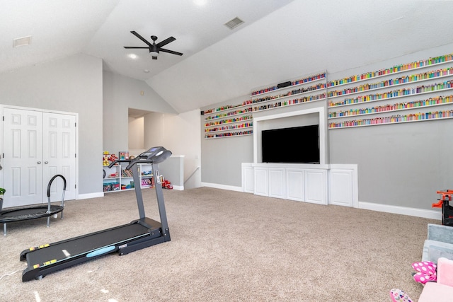 exercise area with vaulted ceiling, carpet floors, ceiling fan, and visible vents