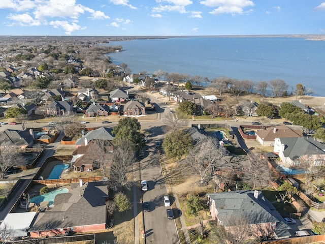 bird's eye view with a water view and a residential view