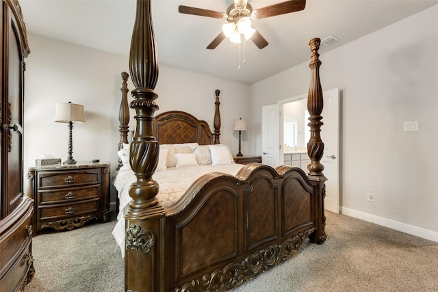 carpeted bedroom featuring ceiling fan and ensuite bathroom