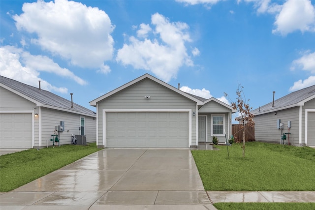 single story home with a front yard, central AC, driveway, and an attached garage