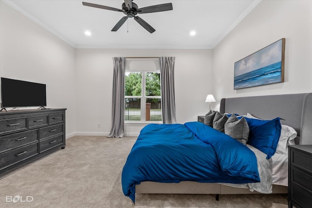 bedroom with light carpet, crown molding, and ceiling fan