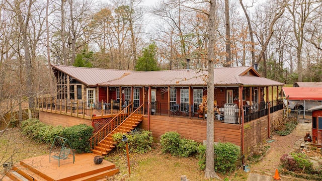 view of front facade featuring a wooden deck