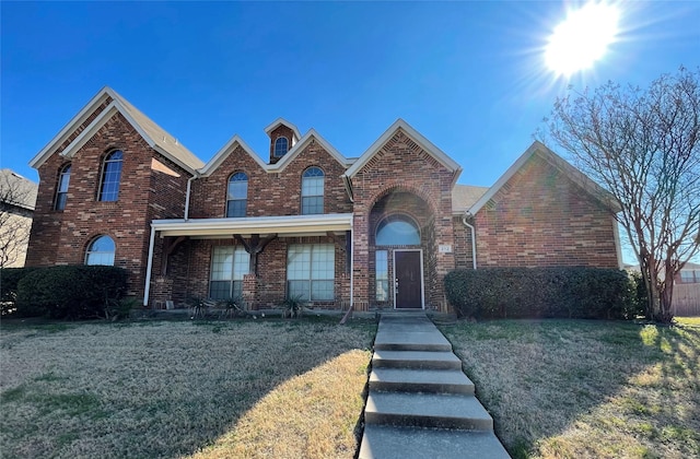 view of front of home with a front yard