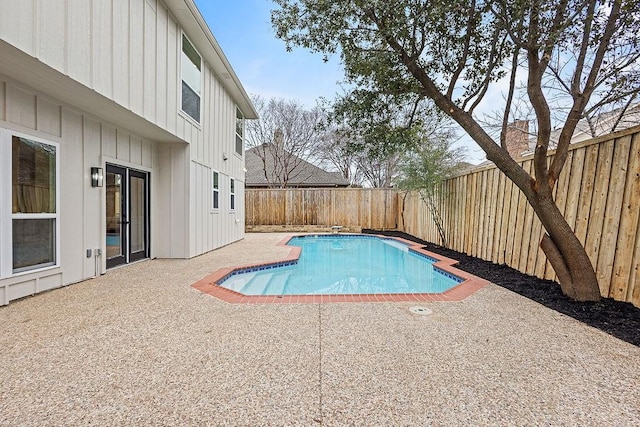 view of pool with a patio, a fenced backyard, and a fenced in pool