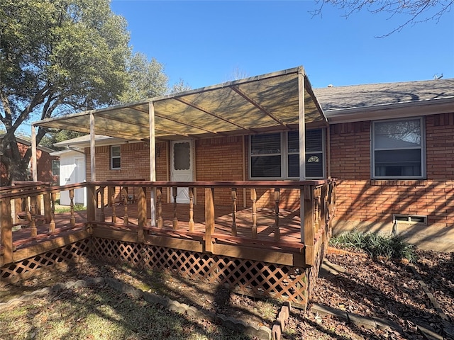 back of property featuring a deck