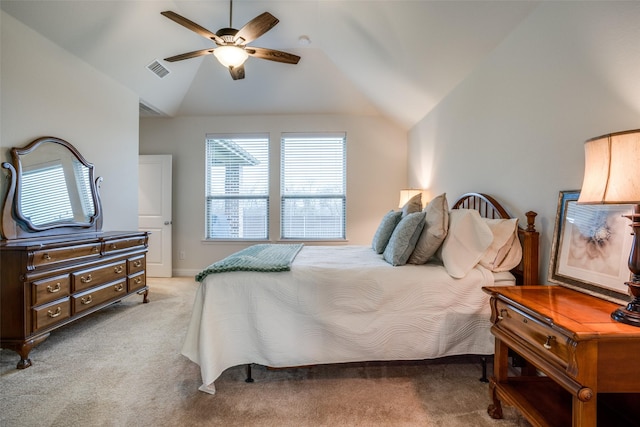 bedroom with light carpet, high vaulted ceiling, ceiling fan, and visible vents