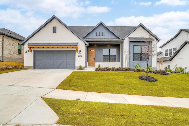 modern farmhouse featuring a front yard and a garage