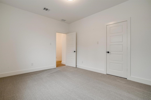 unfurnished room with carpet floors