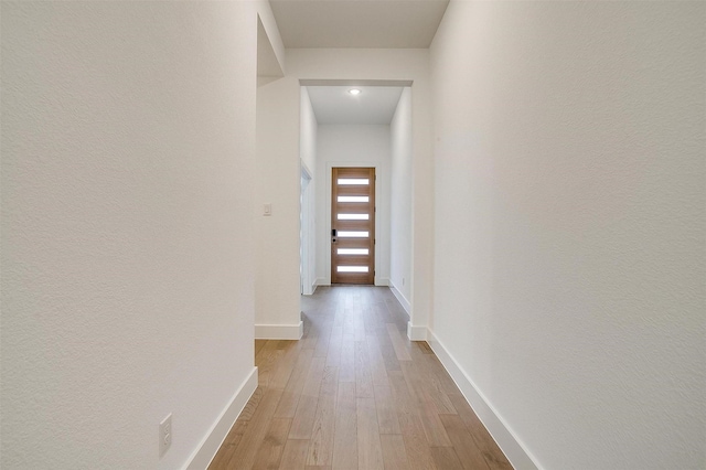 hall featuring light hardwood / wood-style floors