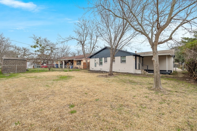 view of yard with fence