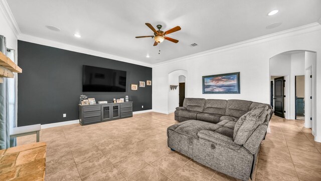 157 Churchill Cir, Weatherford, TX 76085 - living room with arched walkways, ceiling fan, recessed lighting, ornamental molding, and light tile patterned floors
