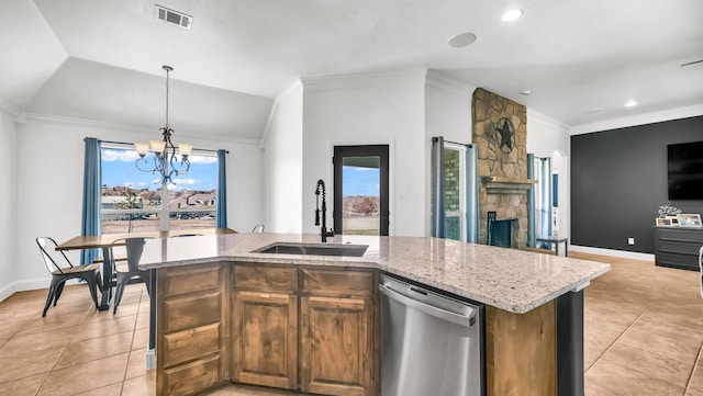 157 Churchill Cir, Weatherford, TX 76085 - kitchen featuring dishwasher, light tile patterned flooring, a chandelier, light stone countertops, and crown molding
