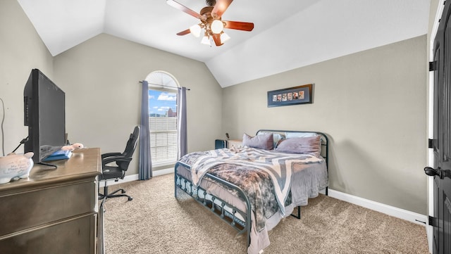 bedroom featuring lofted ceiling, ceiling fan, baseboards, and light colored carpet