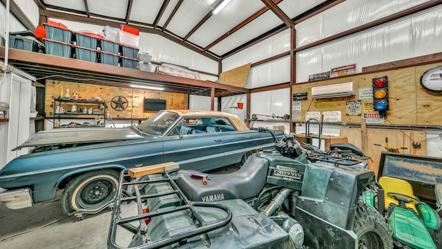 157 Churchill Cir, Weatherford, TX 76085 - garage featuring a wall mounted air conditioner