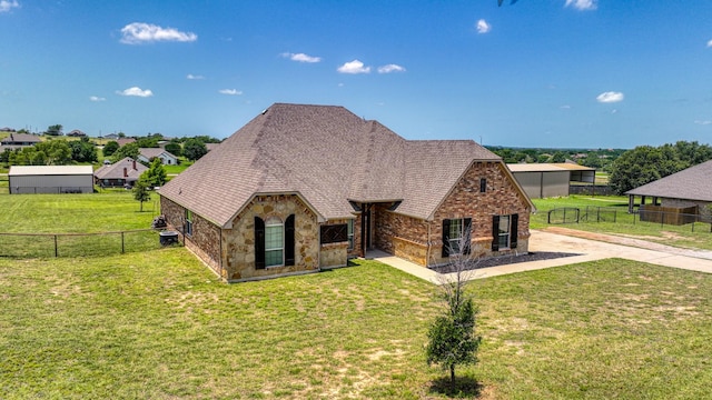 157 Churchill Cir, Weatherford, TX 76085 - view of front of house featuring a shingled roof, stone siding, and brick siding