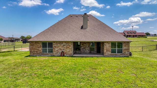 157 Churchill Cir, Weatherford, TX 76085 - rear view of property with a chimney, a patio, a fenced backyard, and brick siding