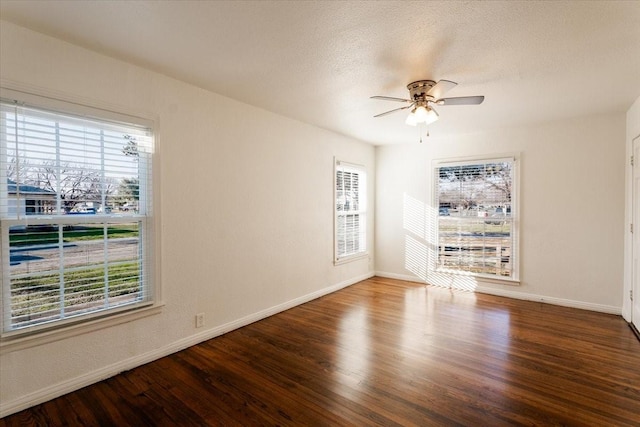 unfurnished room with a textured ceiling, hardwood / wood-style floors, and ceiling fan