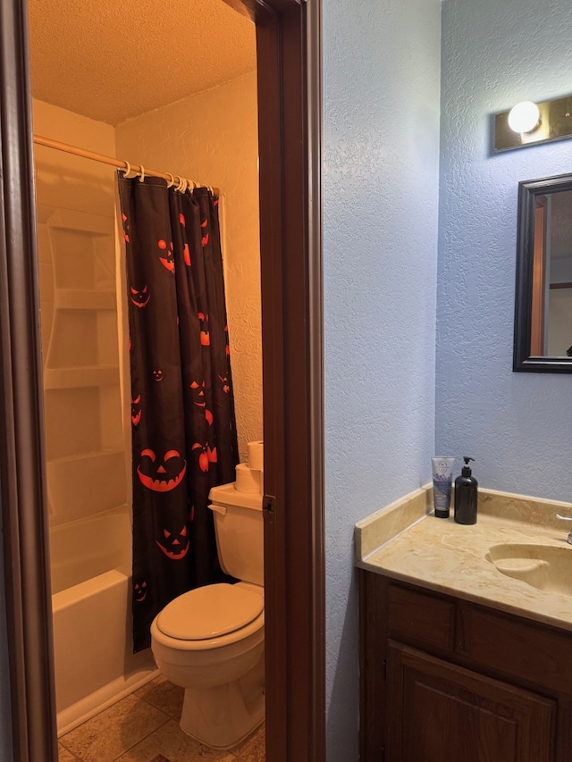 bathroom with a textured wall, toilet, shower / tub combo, vanity, and tile patterned floors