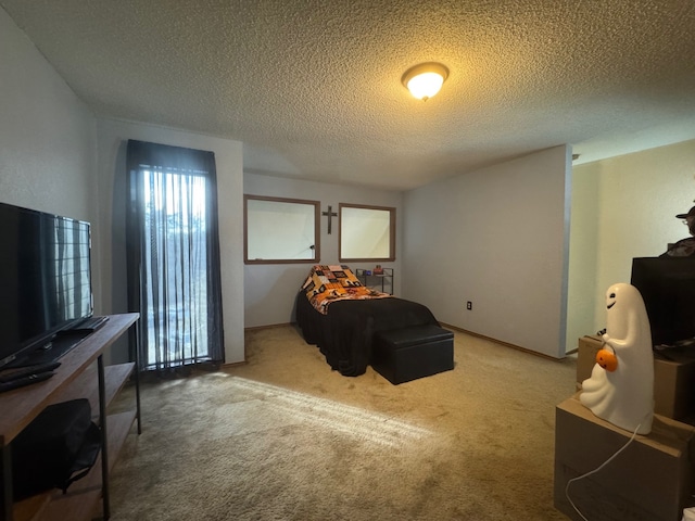 carpeted bedroom with a textured ceiling