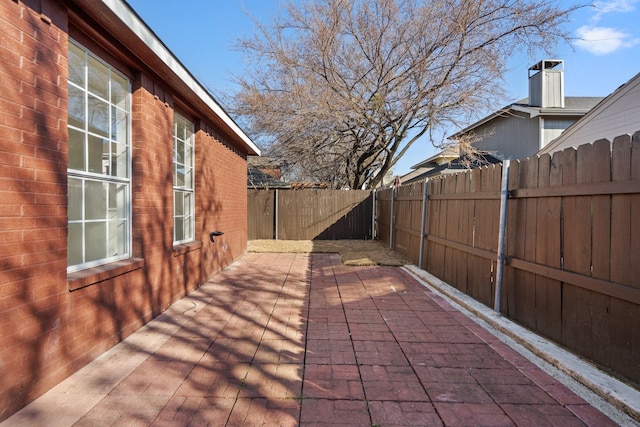 view of patio featuring a fenced backyard