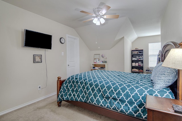 bedroom featuring baseboards, a ceiling fan, carpet flooring, and vaulted ceiling