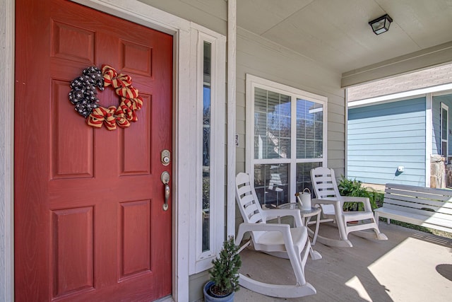 entrance to property with covered porch