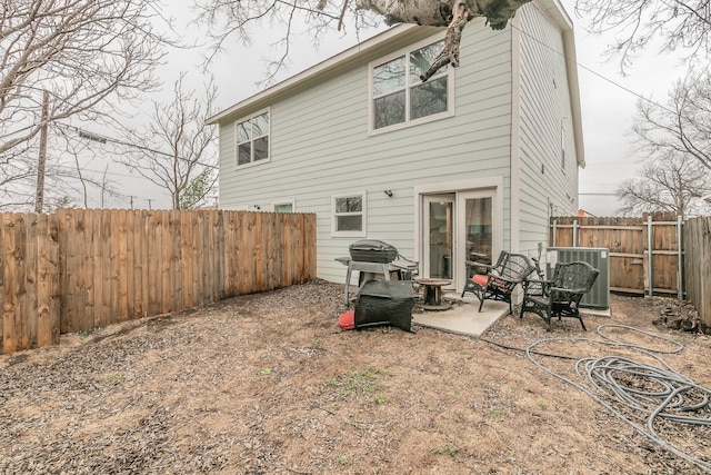 back of house with a patio area