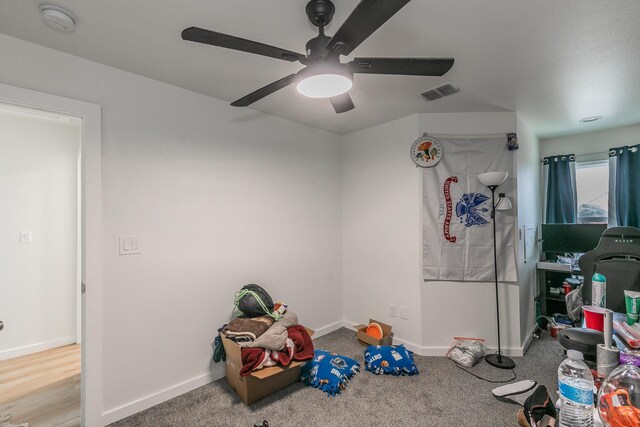 game room featuring carpet and ceiling fan