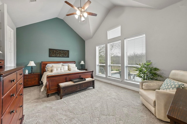 bedroom with visible vents, high vaulted ceiling, a ceiling fan, and light colored carpet