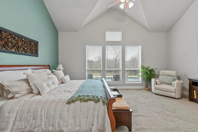 bedroom featuring high vaulted ceiling, carpet flooring, a ceiling fan, and baseboards