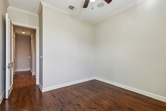 spare room featuring ceiling fan, ornamental molding, and dark hardwood / wood-style flooring