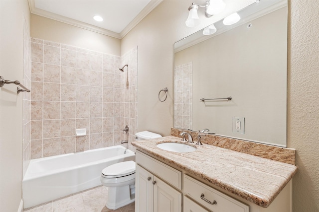 full bathroom with vanity, tiled shower / bath, crown molding, tile patterned flooring, and toilet