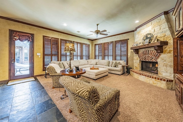 living room with ceiling fan, ornamental molding, and a fireplace