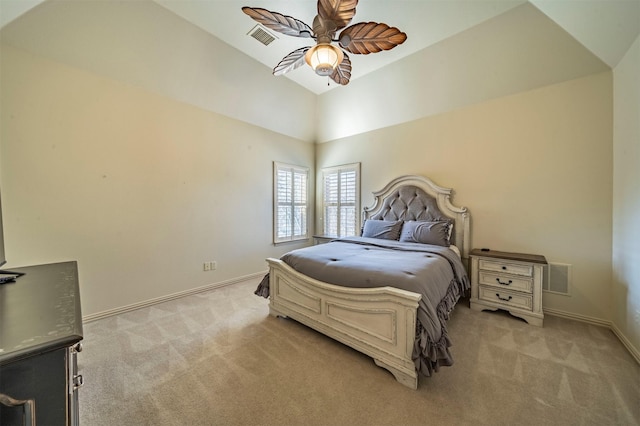 carpeted bedroom with lofted ceiling and ceiling fan