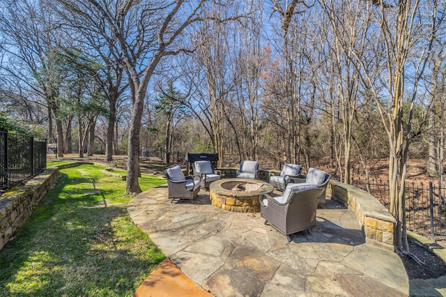 view of patio featuring an outdoor fire pit