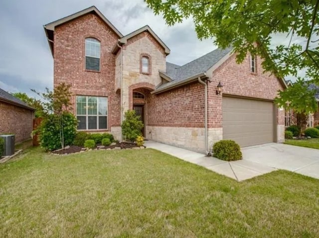 traditional home featuring concrete driveway, stone siding, an attached garage, a front lawn, and brick siding