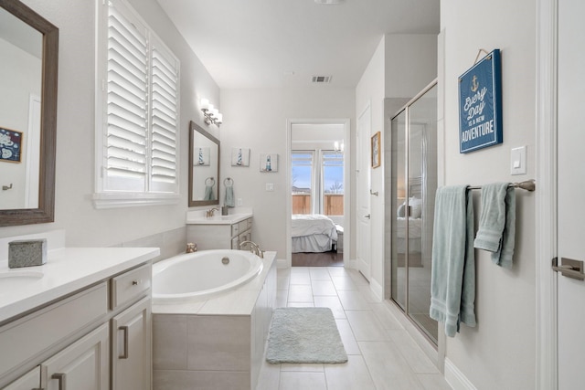 full bath featuring connected bathroom, visible vents, a bath, tile patterned floors, and a stall shower