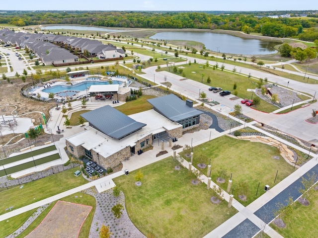 drone / aerial view with a water view