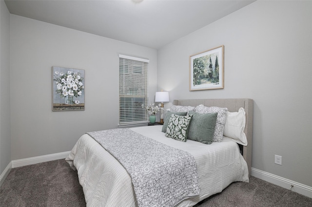 carpeted bedroom with baseboards