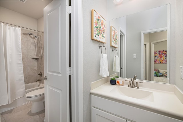 full bath featuring shower / tub combo, tile patterned flooring, vanity, and toilet