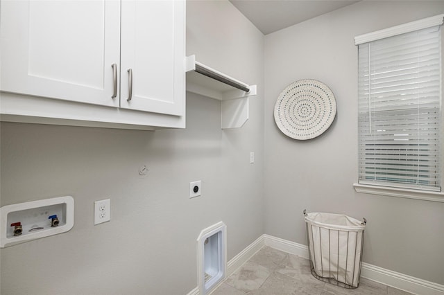 clothes washing area with washer hookup, baseboards, marble finish floor, cabinet space, and electric dryer hookup