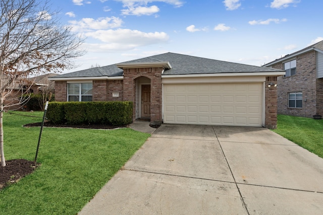 ranch-style house featuring a garage and a front lawn