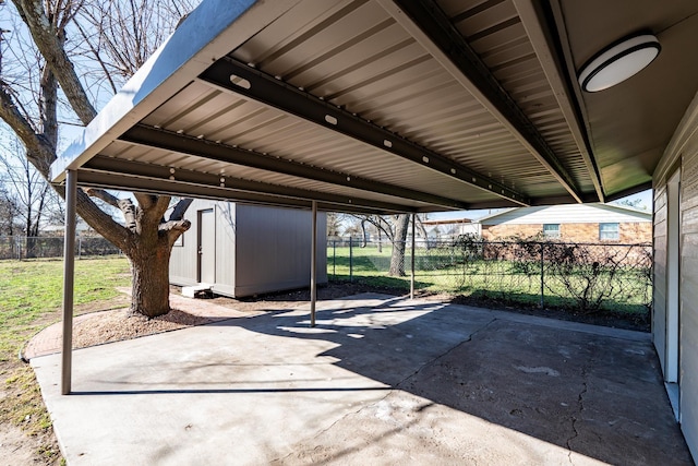 view of patio / terrace featuring a storage shed