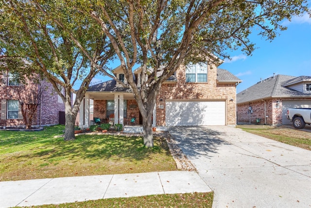 2745 Sunlight Dr, Little Elm, TX 75068 - view of front of house with a garage and a front lawn