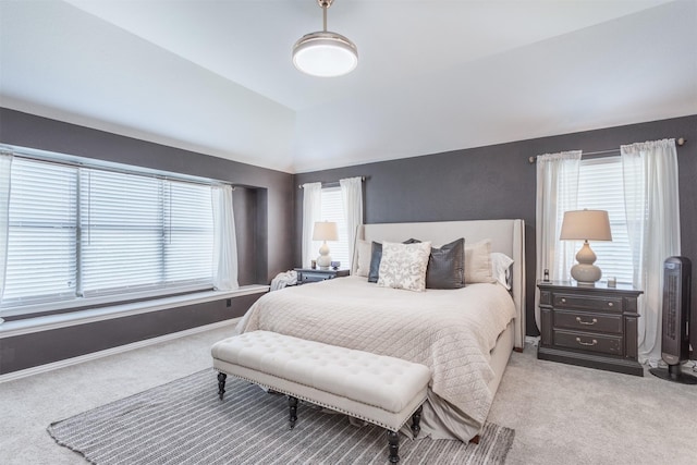 2745 Sunlight Dr, Little Elm, TX 75068 - bedroom featuring vaulted ceiling, multiple windows, and light carpet