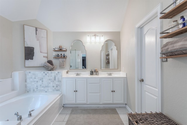 2745 Sunlight Dr, Little Elm, TX 75068 - bathroom with tiled bath, vanity, tile patterned flooring, and lofted ceiling